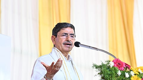 Governor RN Ravi speaking into a mic