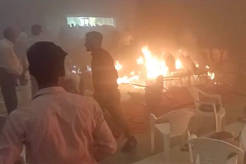 The fire after the blast at a convention of Jehovah's Witnesses