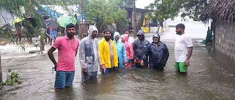 Residents involved in flood relief work in Tambaram