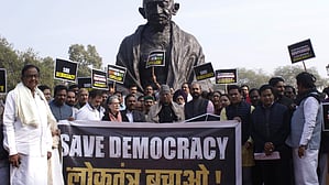 Oppn MPs including Sonia stage protest in Parliament premises over suspension of 141 MPs