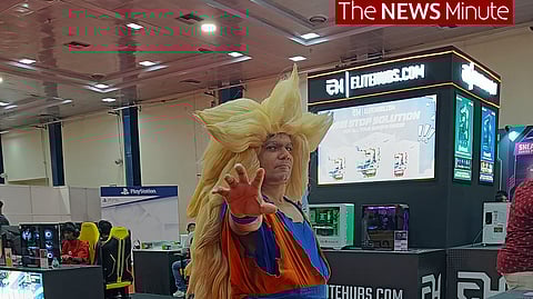A cosplayer dressed as Super Saiyan Goku from Dragon Ball Z