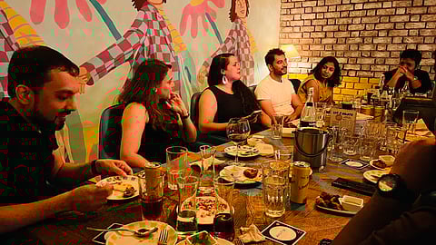 People at a Two Tables event