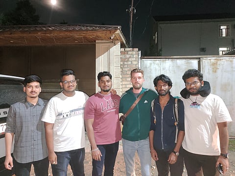 Indian students in Bhiskek before boarding flight to return home