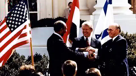 Anwar El Sadat, Jimmy Carter and Menachem Begin at the White House to sign the 1979 Egypt–Israel peace treaty. 