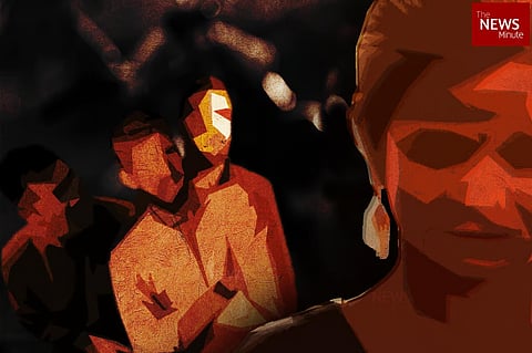 Abstract illustration of a group of men in warm tones against a dark background, with a woman’s partial silhouette. 