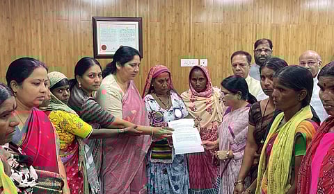 Women farmers of Lagacherla submitting a representation to the National Human Rights Commission (NHRC). 