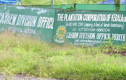 Kerala Division Office sign in green, highlighting the growing protests against the Cheemeni Nuclear Power Plant project.
