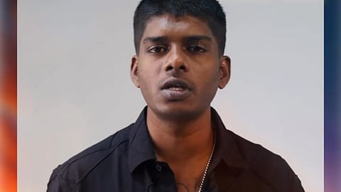 Rapper Vedan facing the camera, wearing a black shirt