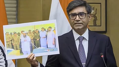 Foreign Secretary Vikram Misri shows a photograph of US-designated terrorist Abdur Rauf leading prayers for those killed in Operation Sindoor.