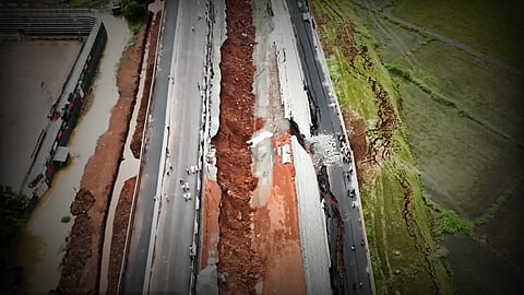 A section of  National Highway 66 caved in near Kooriyad in Kerala’s Malappuram district