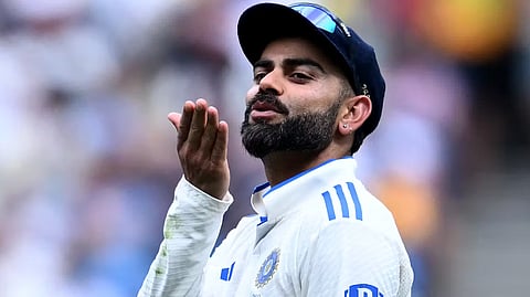 India’s Virat Kohli blows a kiss to the crowd during a Test against Australia.