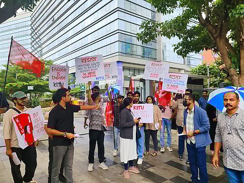 Members of Karnataka IT Union campaign against increase in working hours.