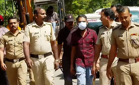 Police and the accused during evidence collection 