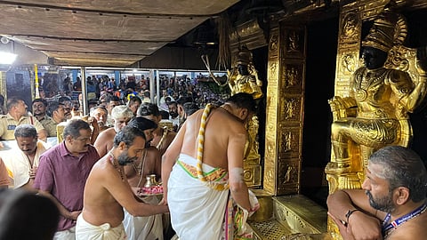 The Dwarapalakas on either side of the Sreekovil in Sabarimala