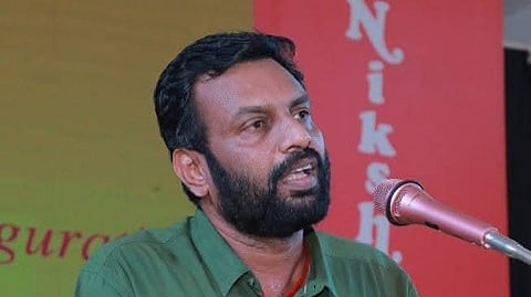Image featuring Sandosh Kumar P wearing a green shirt 