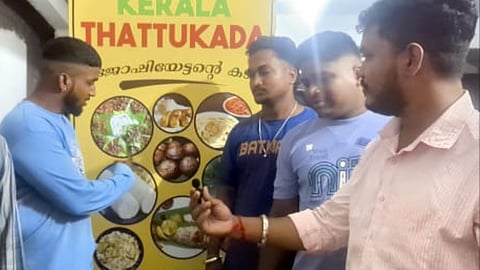 Members affiliated with the Bajrang Dal outside the Kerala restaurant in Hyderabad's Sitaphalmandi area