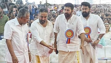 Chief Minister Pinarayi Vijayan with actors Kamal Haasan, Mammootty, and Mohanlal at the Keraleeyam event in 2023