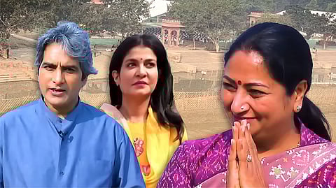 A composite image shows three people in front of a riverbank backdrop. On the left, a man wearing a blue shirt is speaking, appearing as a TV anchor. In the centre, a woman in a yellow outfit looks on with a neutral expression. On the right, another woman, dressed in a purple saree, smiles and folds her hands in greeting. The background appears to be an artificially cleaned or staged riverbank area, with visible fences and dry soil.