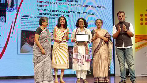 Anisha Sheth and Shivani Kava receiving the award
