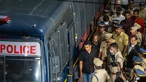 Image featuring police taken Pulsar Suni into jail after judgement 