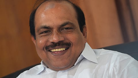Image featuring V K Ebrahimkunju wering white shirt  