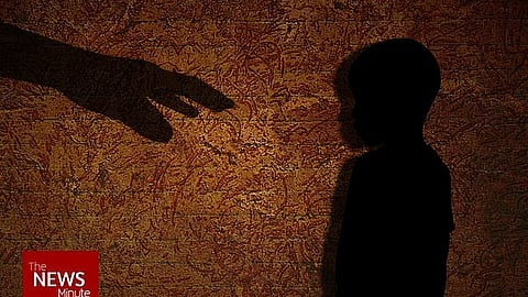 A silhouetted child stands against a textured dark background while an outstretched adult hand reaches toward them. The image symbolically represents child abuse and sexual violence cases involving minors.