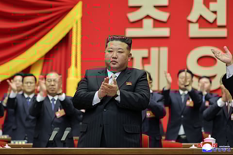 This photo provided Monday, Feb. 23, 2026, by the North Korean government, its leader Kim Jong Un, center, claps hands as he was re-elected to the top post of the ruling Workers’ Party, during the party's Congress in Pyongyang, Sunday, Feb. 22, 2026. Independent journalists were not given access to cover the event depicted in this image distributed by the North Korean government. The content of this image is as provided and cannot be independently verified. Korean language watermark on image as provided by source reads: "KCNA" which is the abbreviation for Korean Central News Agency. 