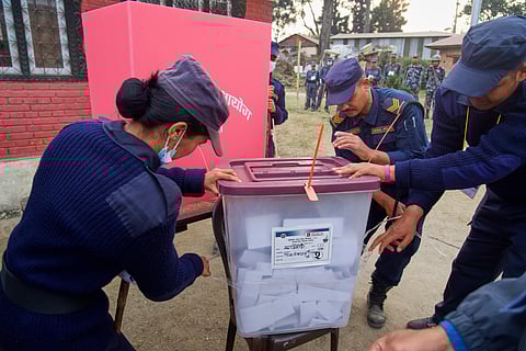 Police personals close the ballot box at the end of the polling during the parliamentary election in Kathmandu, Nepal, Thursday, March 5, 2026. 
