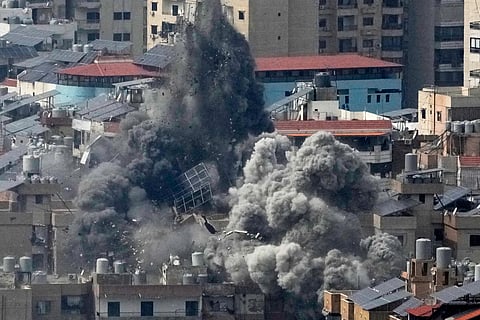 Smoke rises following an Israeli airstrike in Dahiyeh, Beirut's southern suburbs, in Beirut, Lebanon, Friday, March 6, 2026. 