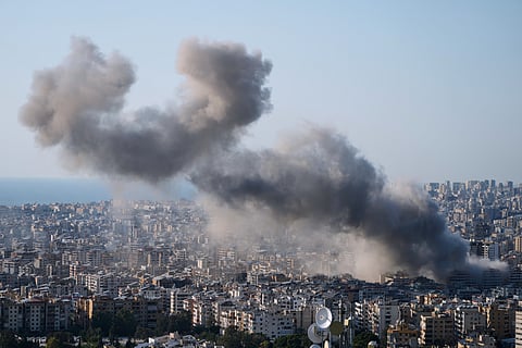 Smoke rise from an Israeli airstrike in Dahiyeh, Beirut's southern suburbs, Lebanon, Tuesday, March 10, 2026. 