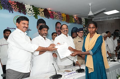 Telangana Ministers Ponguleti Srinivas Reddy, Mallu Bhatti Vikramarka and Tummala Nageshwara Rao handing over pattas to Velugumatla evictees