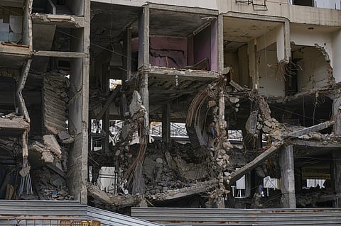 A view of a building damaged in an Israeli airstrike, in Dahiyeh, Beirut's southern suburbs, Beirut's southern suburbs, Lebanon, Monday, March 16, 2026.