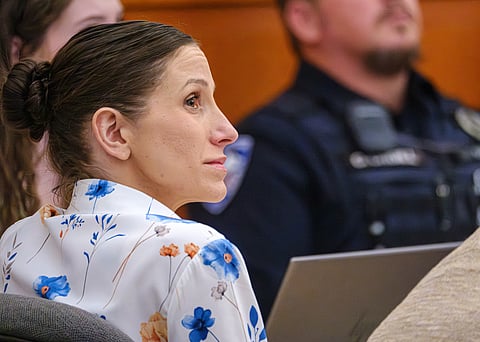 Defendant Kouri Richins, left, accused of poisoning her husband in March 2022, listens to closing arguments in Third District Court, Monday, March 16, 2026, in Park City, Utah. 