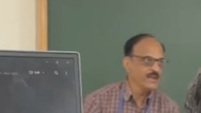Professor Muralidhar Deshpande is heard shouting at the student and using the term “terrorist.” 