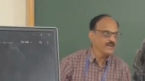 Professor Muralidhar Deshpande is heard shouting at the student and using the term “terrorist.” 