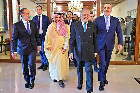 In this photo released by the Pakistan Ministry of Foreign Affairs, from left, Egyptian Foreign Minister Badr Abdelatty, Saudi Arabia's Foreign Minister Prince Faisal bin Farhan Al-Saud, Pakistan's Foreign Minister Ishaq Dar and Turkish Foreign Minister Hakan Fidan walk prior to their meeting to discuss the Middle East war, in Islamabad, Pakistan, Sunday, March 29, 2026. 