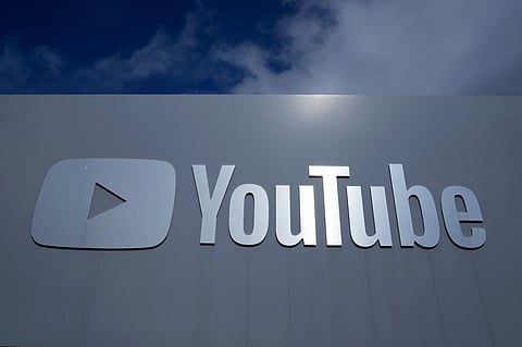A YouTube sign is shown near the company's headquarters in San Bruno, Calif., Wednesday, March 12, 2025.