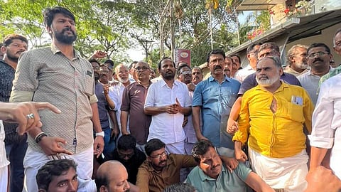 Image featuring TN Prathapan during the protest 