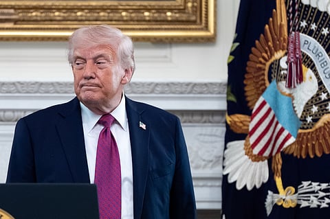 President Donald Trump departs after speaking at an event for NCAA national champions in the State Dining Room of the White House, Tuesday, April 21, 2026, in Washington. 