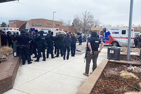 Boulder police personnel at the spot of the shooting