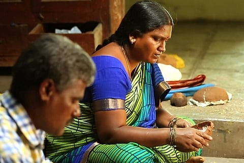 Mallesham and Manga creating a cheriyal painting together