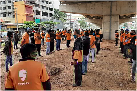 Swiggy delivery executives say that their income has halved following the new regulations