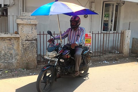 The Umbrella Man: Coimbatorean’s over-head bike gear to your summer rescue