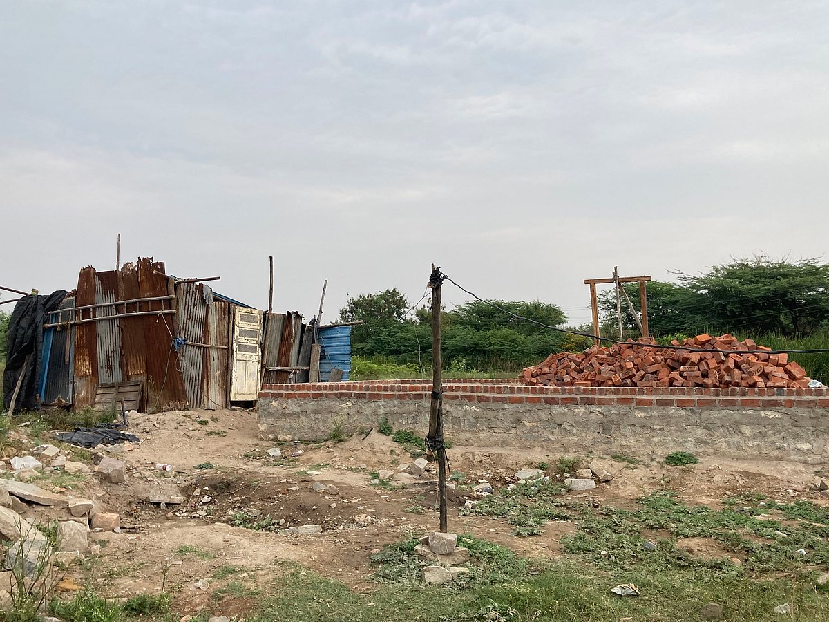 Ganesh’s family’s makeshift house built with scrap asbestos put together