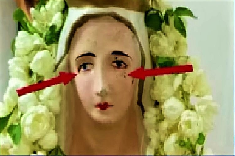 After reports of a Mother Mary statue 'bleeding tears’, hundreds throng