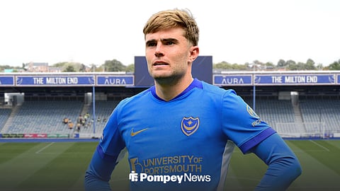 Portsmouth's Zak Swanson with Fratton Park background