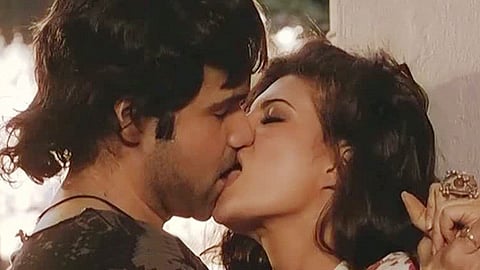 Emraan Hashmi and Jacquline Fernandes get tongue twisted in <i>Murder 2. </i>