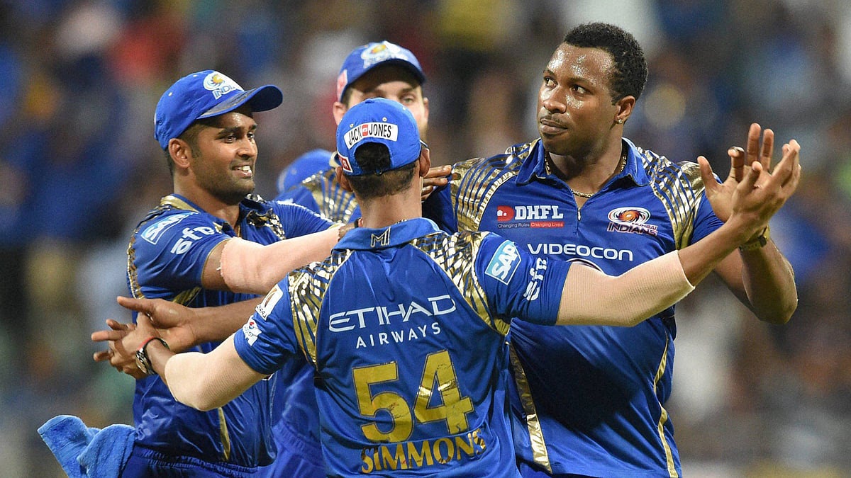 Mumbai Indians players celebrate their win against Kolkata Knight Riders during an IPL T20 match in Mumbai. (Photo: PTI)