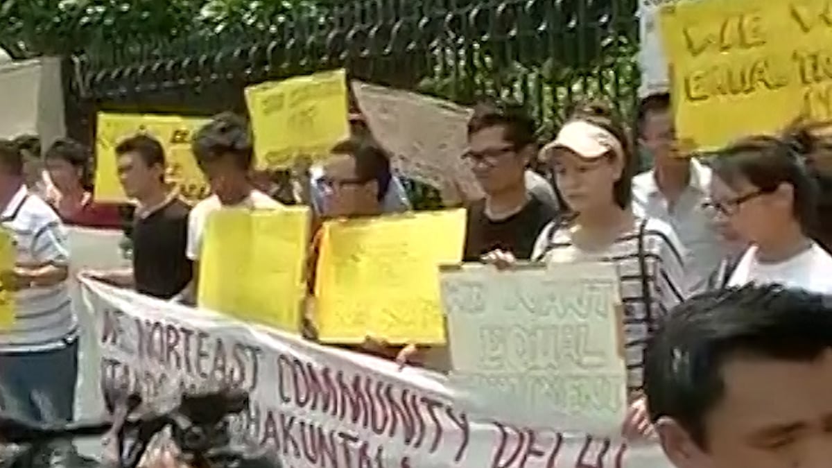 The city’s Northeast community protests outside the Delhi Secretariat. (Photo: ANI)