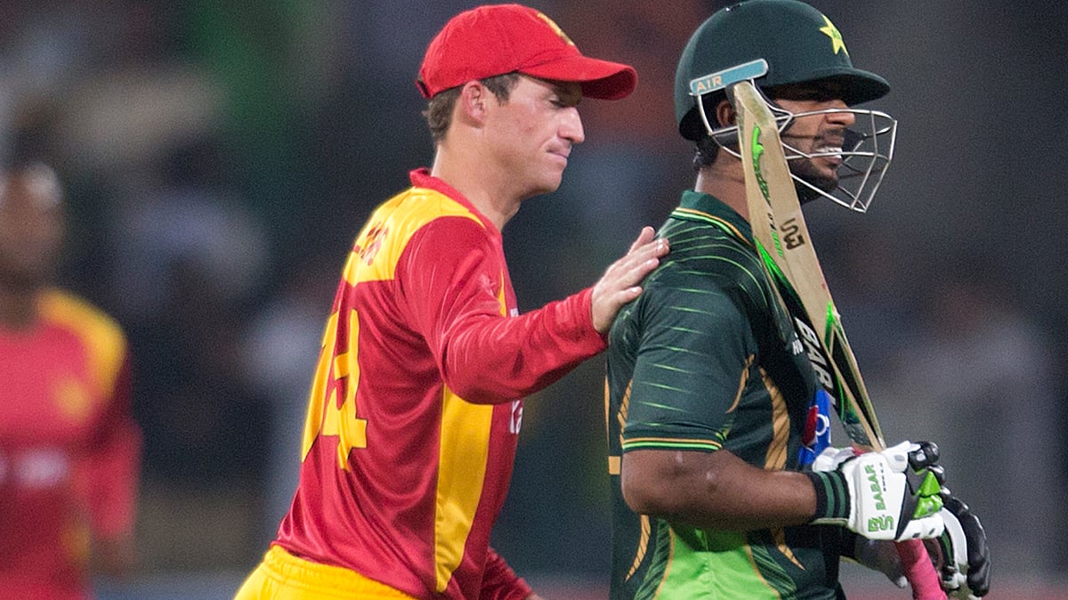 Zimbabwe’s Sean Collin Williams greets Pakistan’s highest scorer Mukhtar Ahmed who scored 83 at the Gaddafi stadium in Lahore. (Photo: AP)